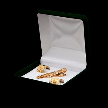 SLIPSNÅL och MANCHETTKNAPPAR, guld 14K, små diamanter, "Crust of Ice" Björn Weckström Lapponia. Vikt 16,6.