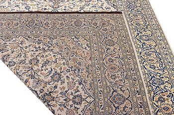 A Kashan rug, a. 250 x 242 cm.