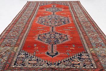 A Malayer runner, west Persia, c. 560 x 200 cm.