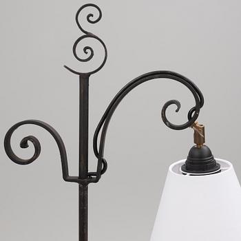 Harald Notini, a pair of wrought iron floor lamps, model '15101', Arvid Böhlmarks Lampfabrik, 1930's.