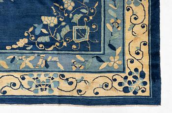 An antique Peking (Beijing) carpet, North China, c. 340 x 275 cm.