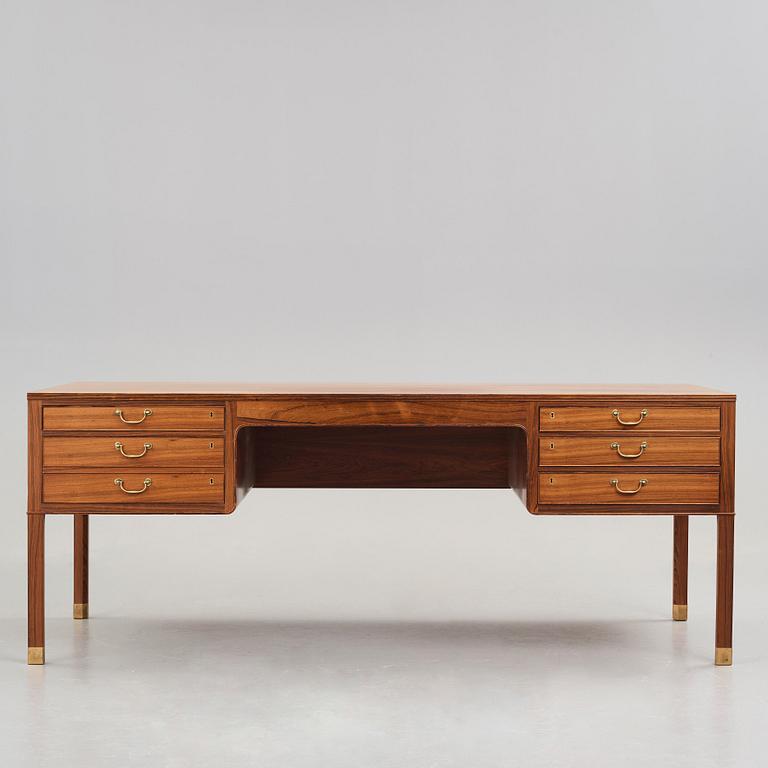 Ole Wanscher, a palisander desk by cabinetmaker A.J. Iversen, Denmark 1940's-50's.