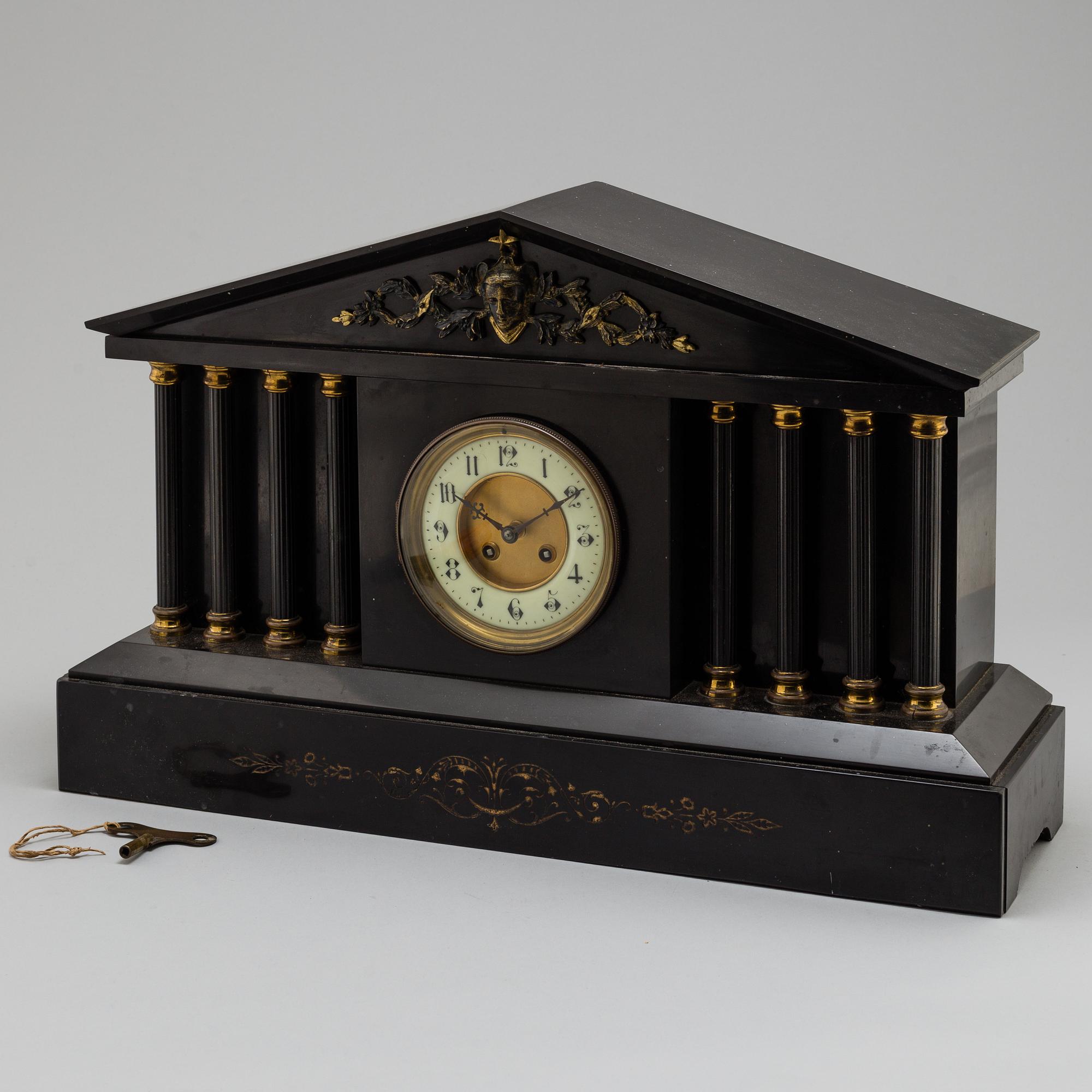 An end of the 19th century stone mantle clock.