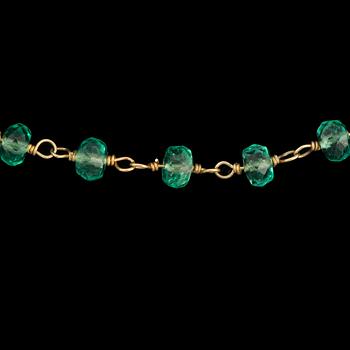 An emerald necklace. Total gem weight circa 57.70 cts.