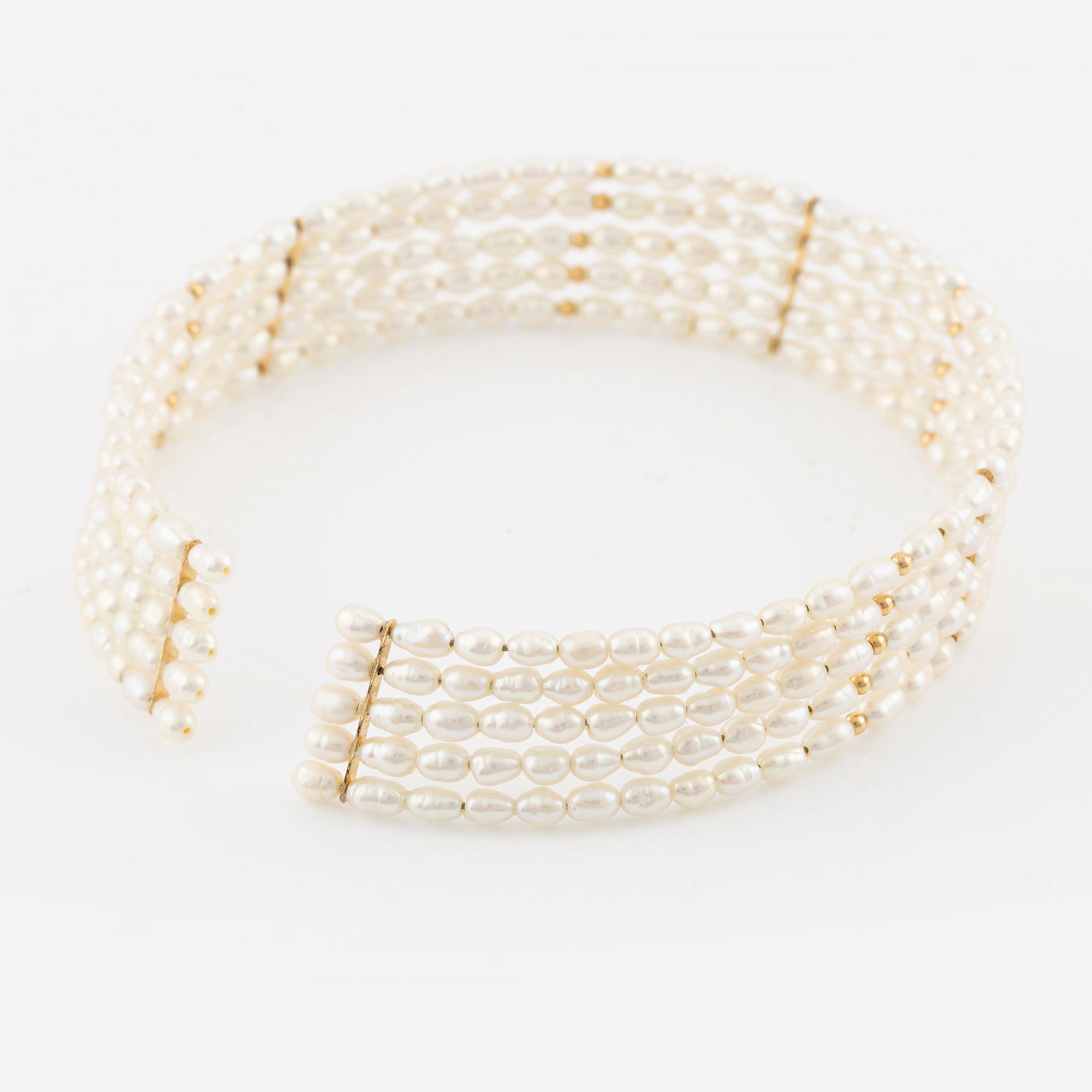 Five-row collar/choker with cultured freshwater pearls and 14K gold beads.