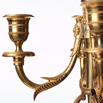 A pair of Empire 19th century five-light candelabra.