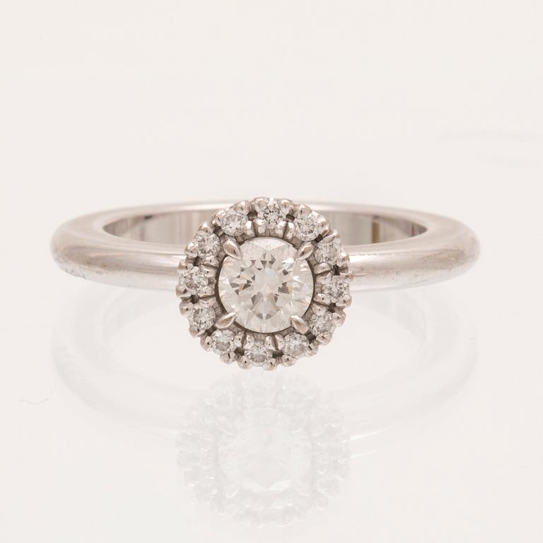 An 18K white gold ring with round brilliant cut diamonds by Engelbert, with GIA dossier.