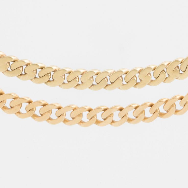 A two-rowed, flattened curb-link necklace.