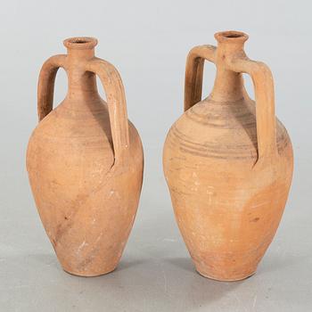 Two European earthenware jars from the first half of the 20th century.