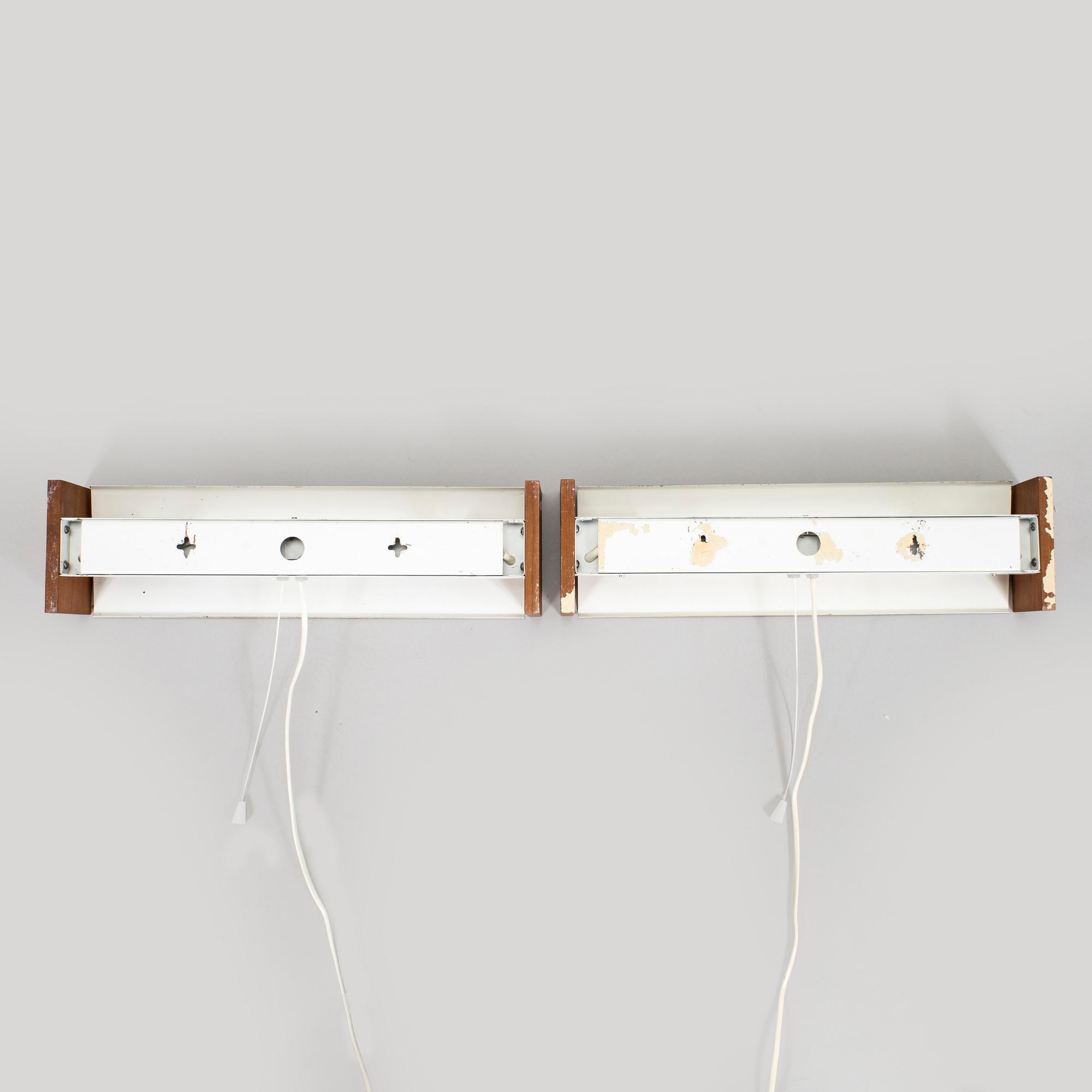 A pair of 1960s/70s wall lamps marked by Valinte.
