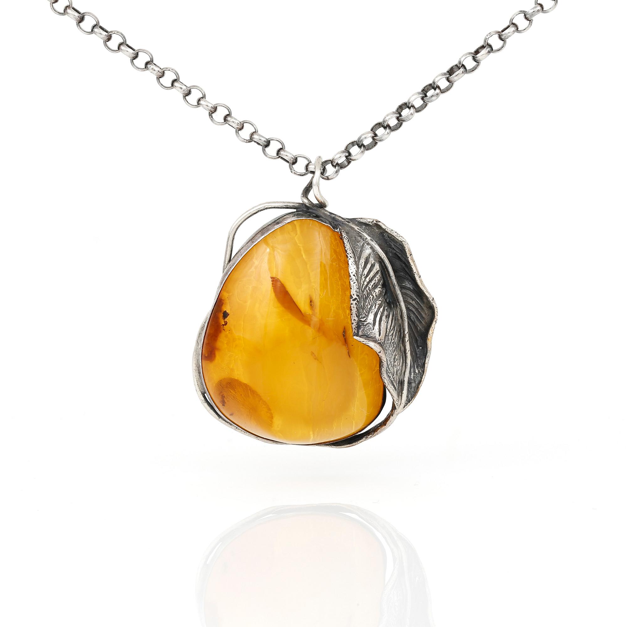 HÄNGE och ÖRHÄNGEN, ett par, sterlingsilver med bärnsten, Danmark. Total vikt ca 35 g.