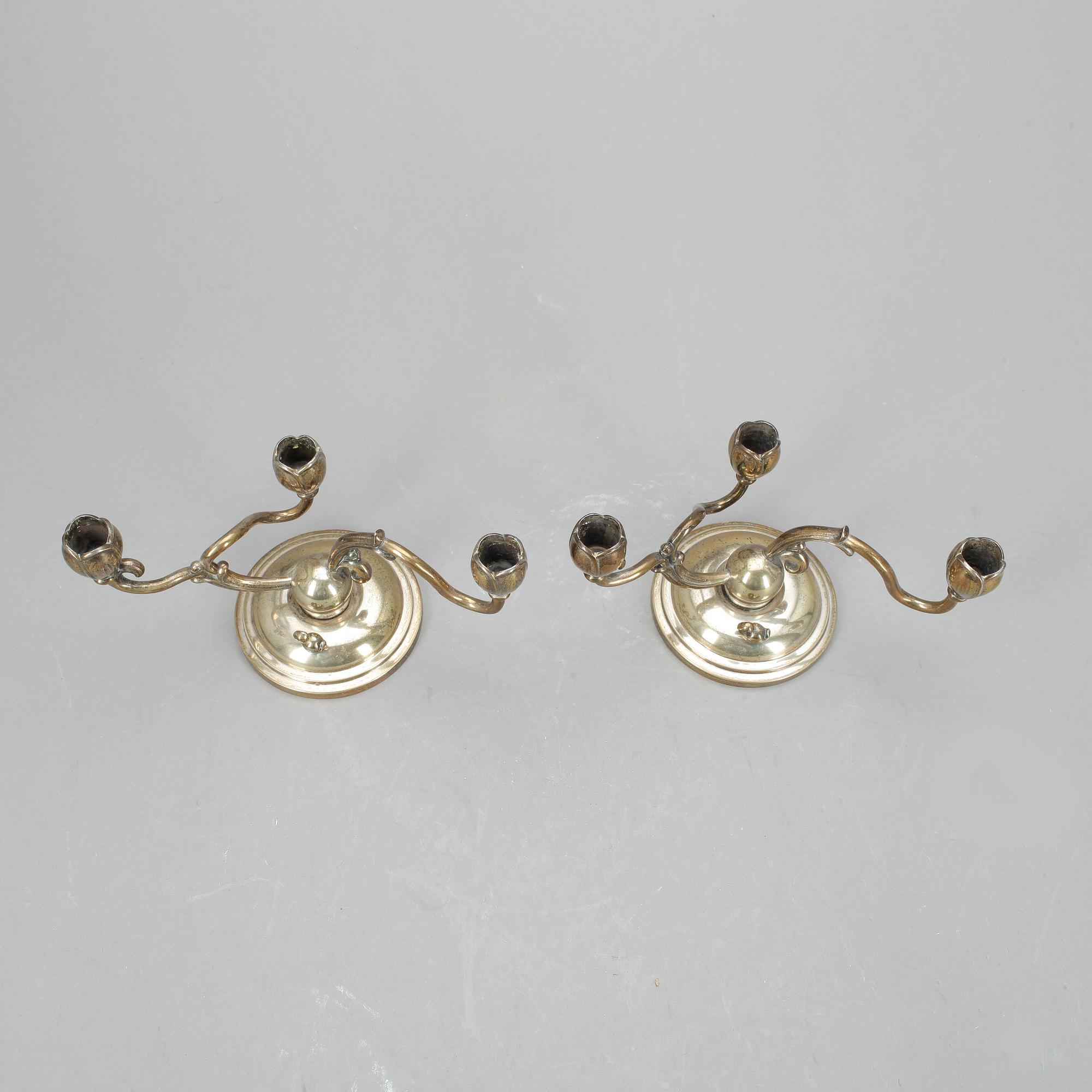 LJUSSTAKAR, ett par, W A Bolin, silver, 1950.