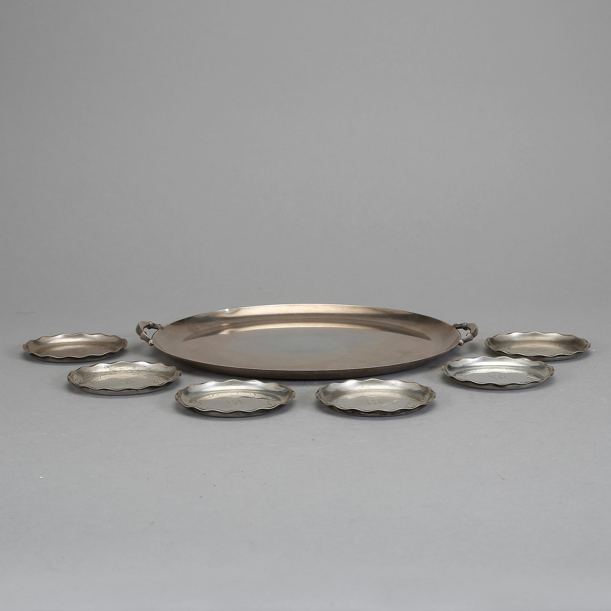 BRICKA och COASTERS, 7 delar, silver, Sverige samt Tyskland, 1900-tal. Vikt ca 722 g.