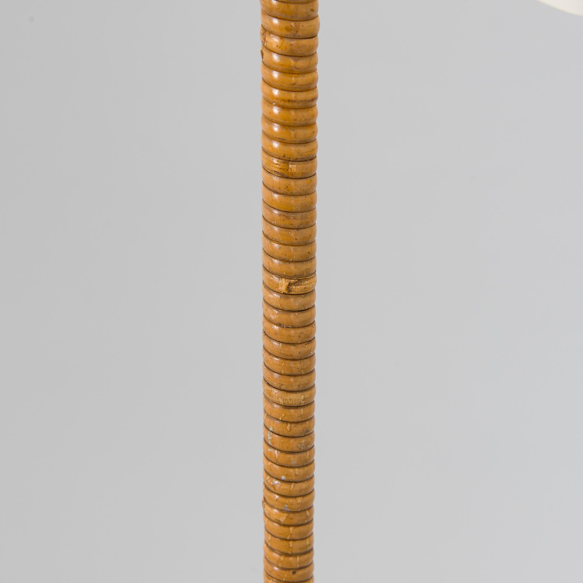 Paavo Tynell, a mid-20th century K10-10 floor lamp for Taito.