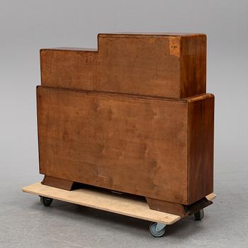 A walnut veneered cabinet, 1930's.