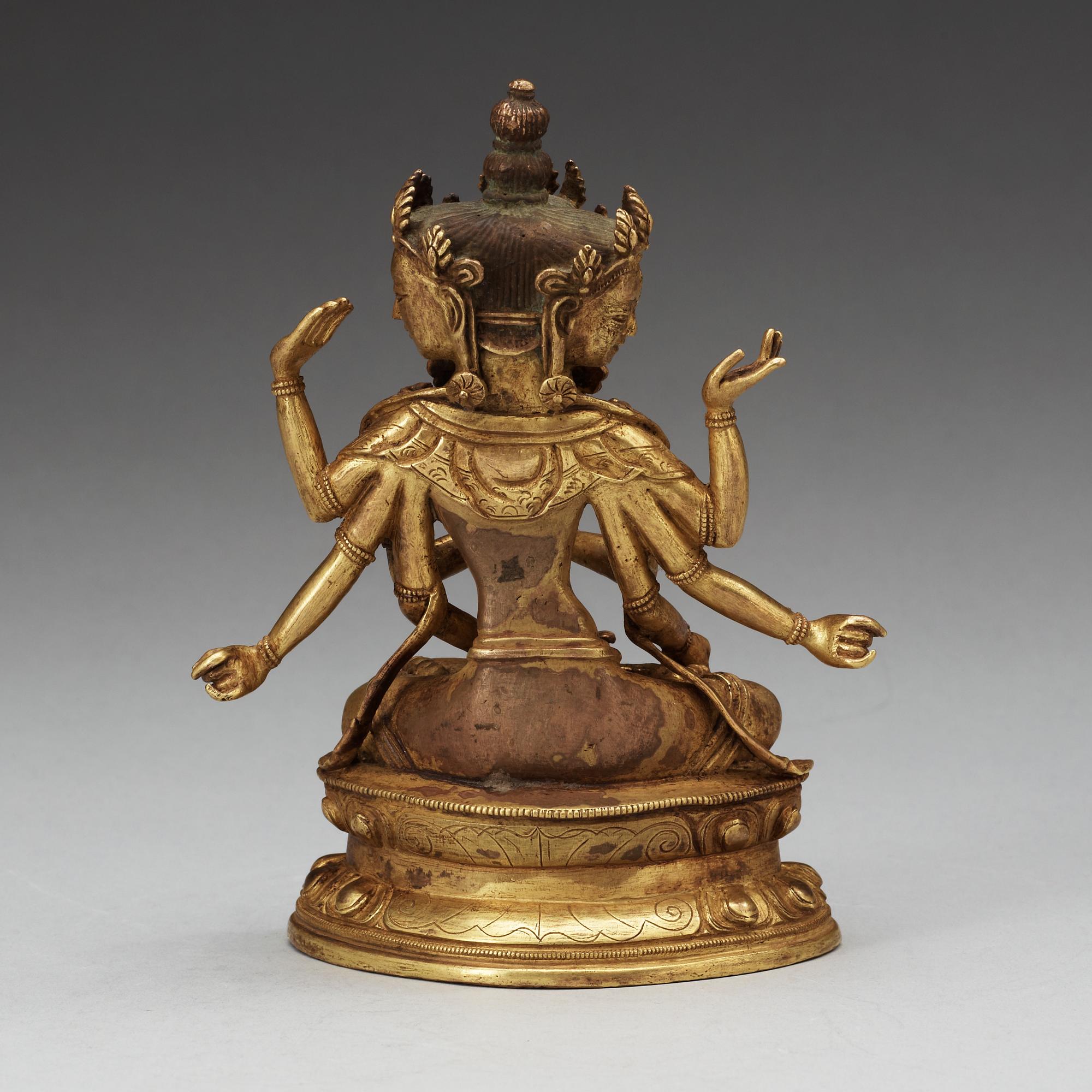 A Sino-Tibetan bronze figure of Ushnishaijaya, with Qianlong mark, late Qing dynasty.