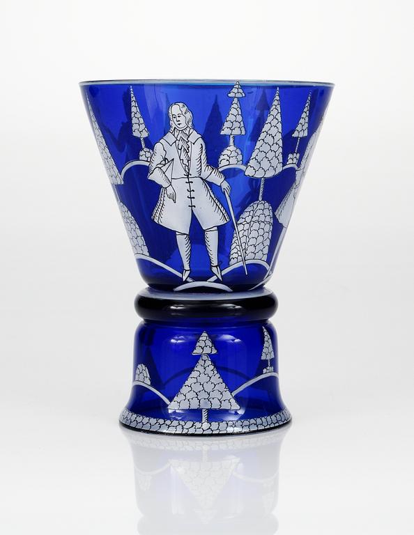 A Wiener Werkstätte blue glass goblet in a design by Josef Hoffmann. Signed WW.
