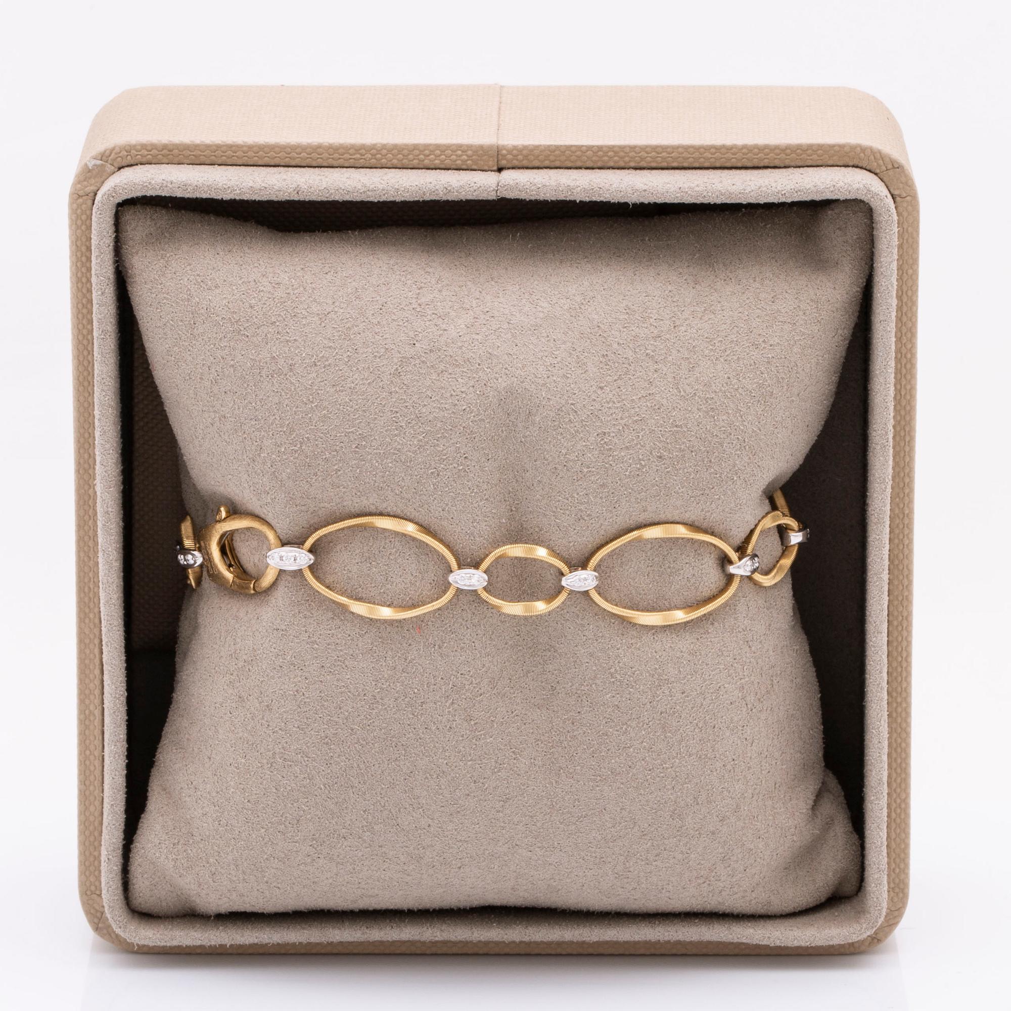 Marco Bicego Italy, bracelet 18k gold and whitegold, brilliant-cut diamonds approx 0,20 ct in total, total weight 9,8 g.