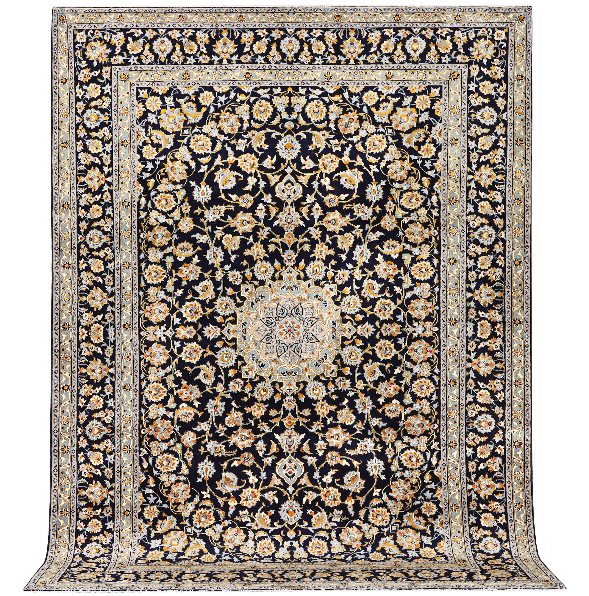 A Keshan carpet, c. 365 x 259 cm.