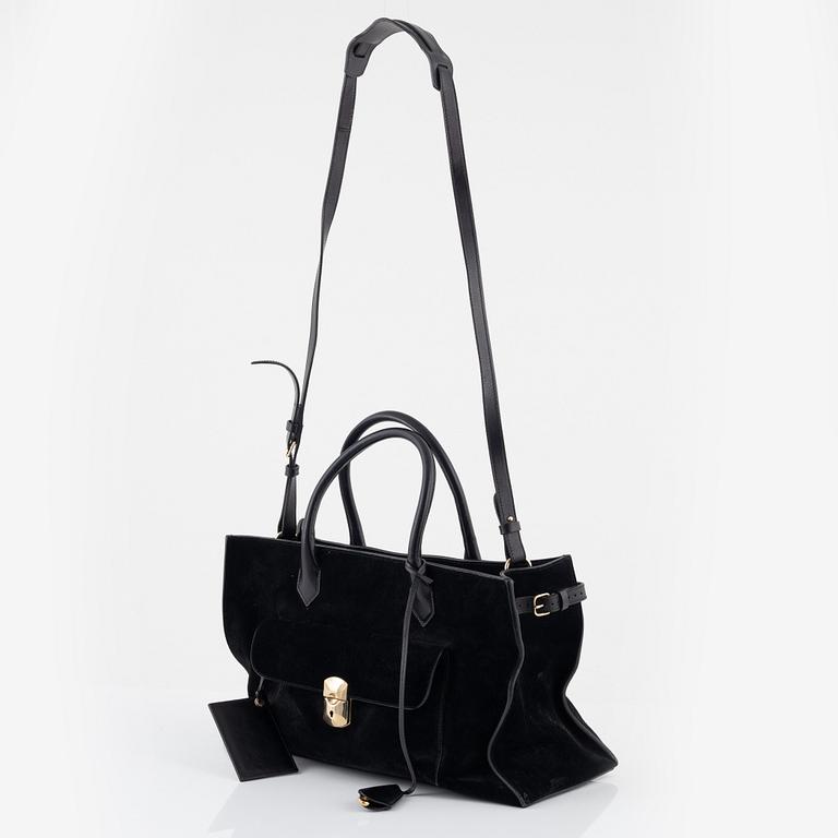 Balenciaga, A black suede and leather bag.