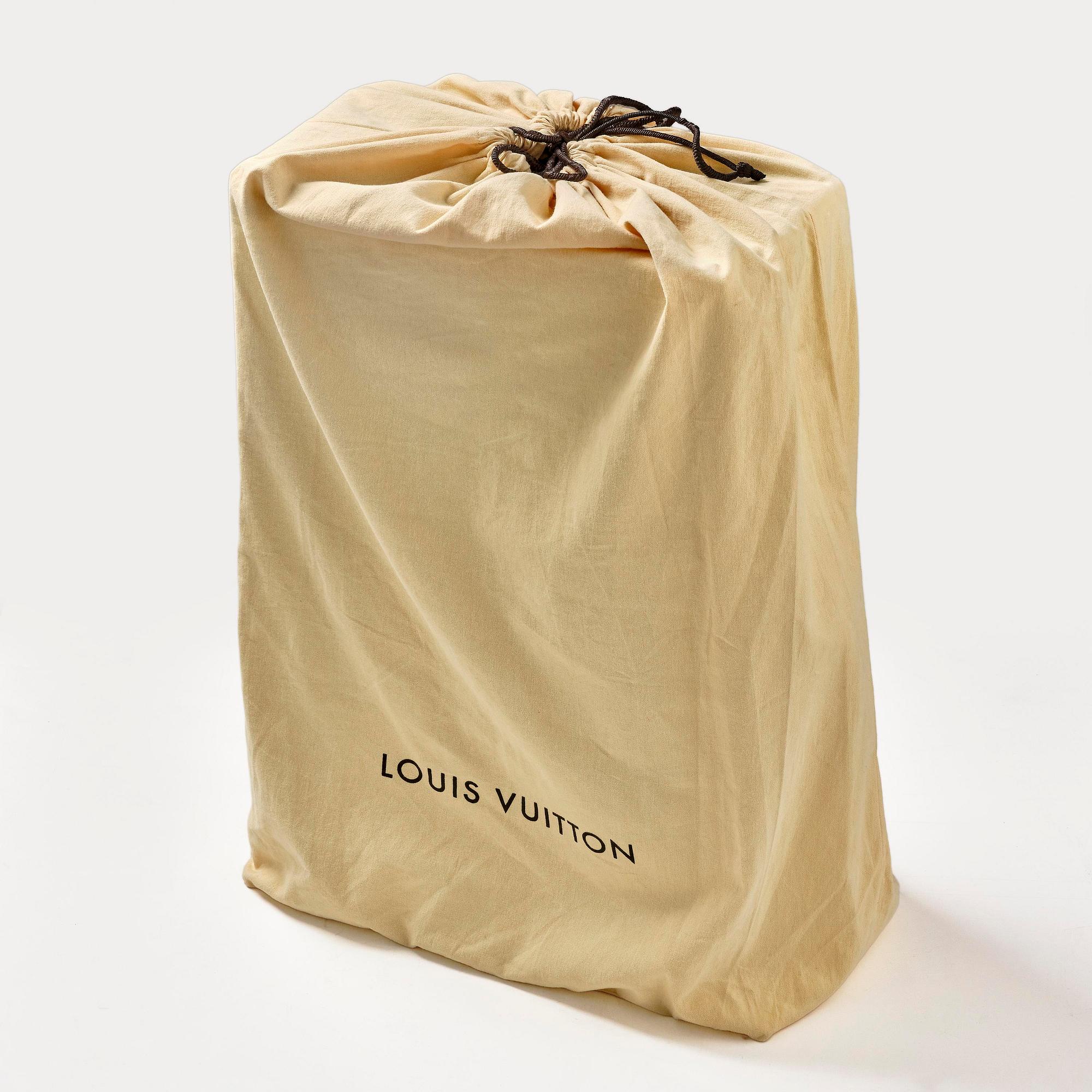 Louis Vuitton, Vintage “Alzer 60” suitcase.