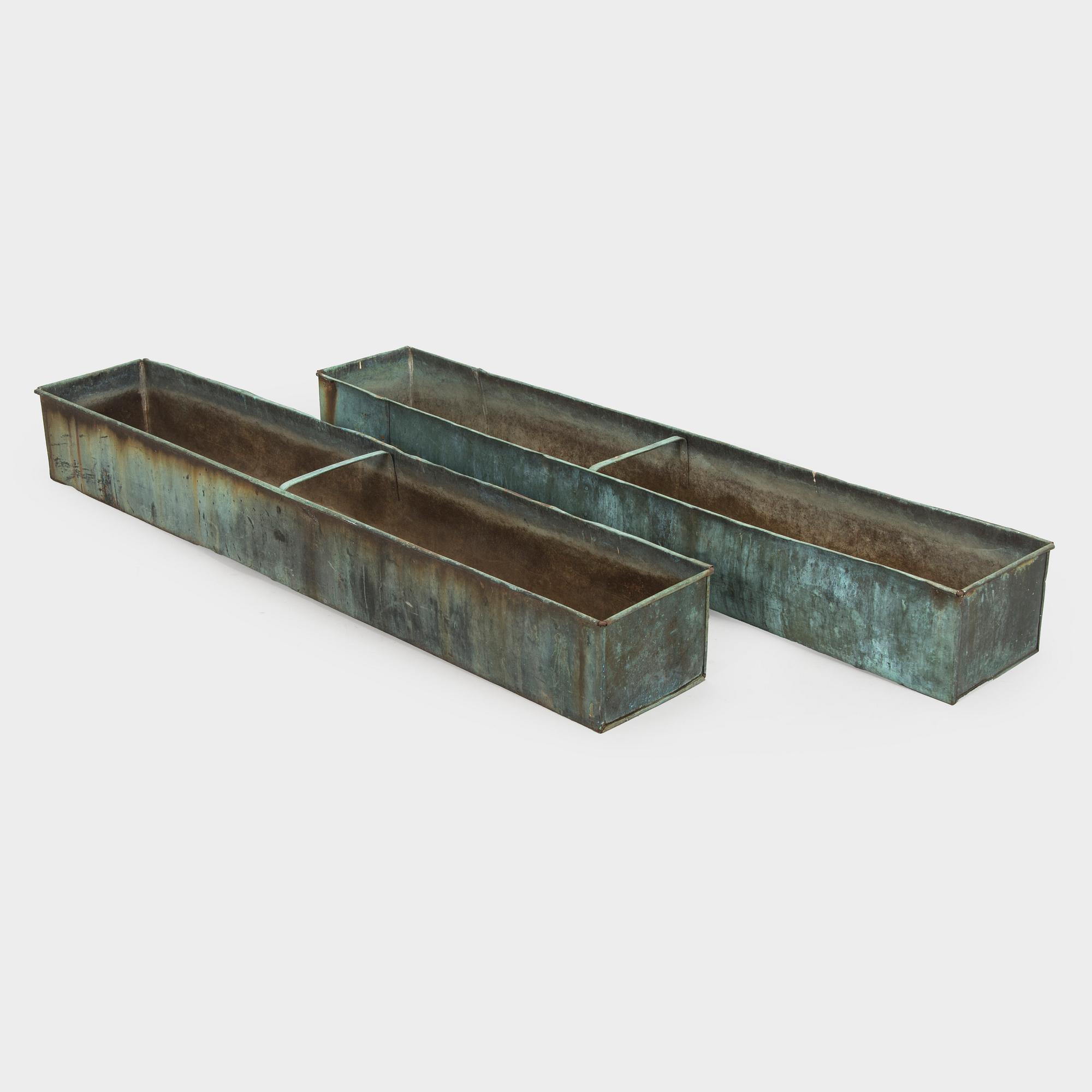 Two mid-20th century planters.