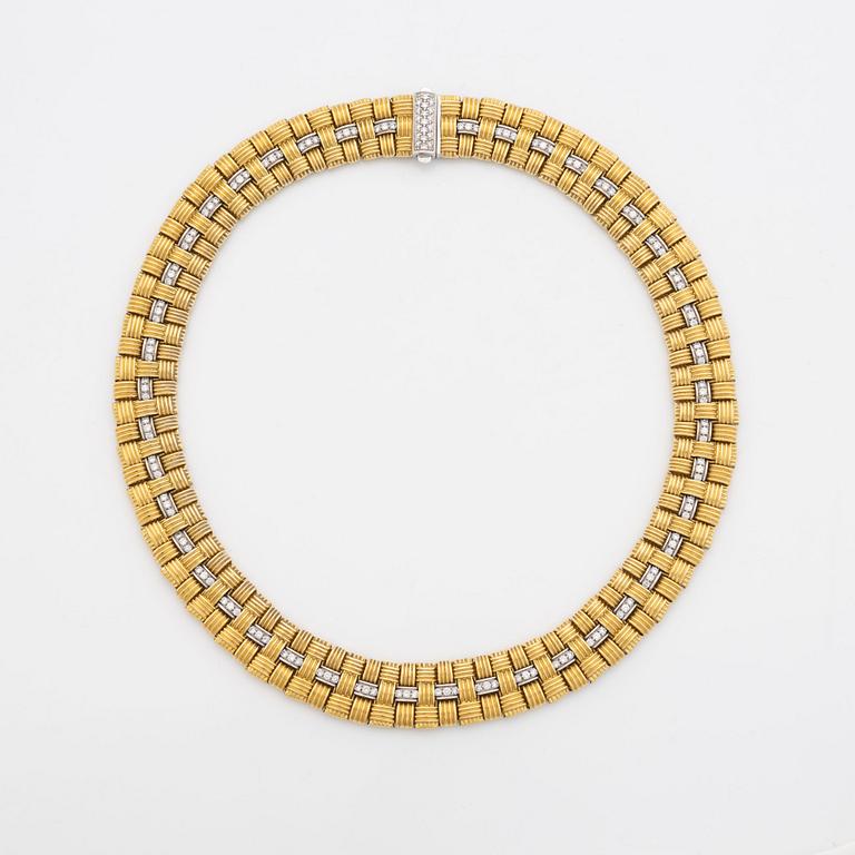 An 18K gold necklace set with round brilliant-cut diamonds.