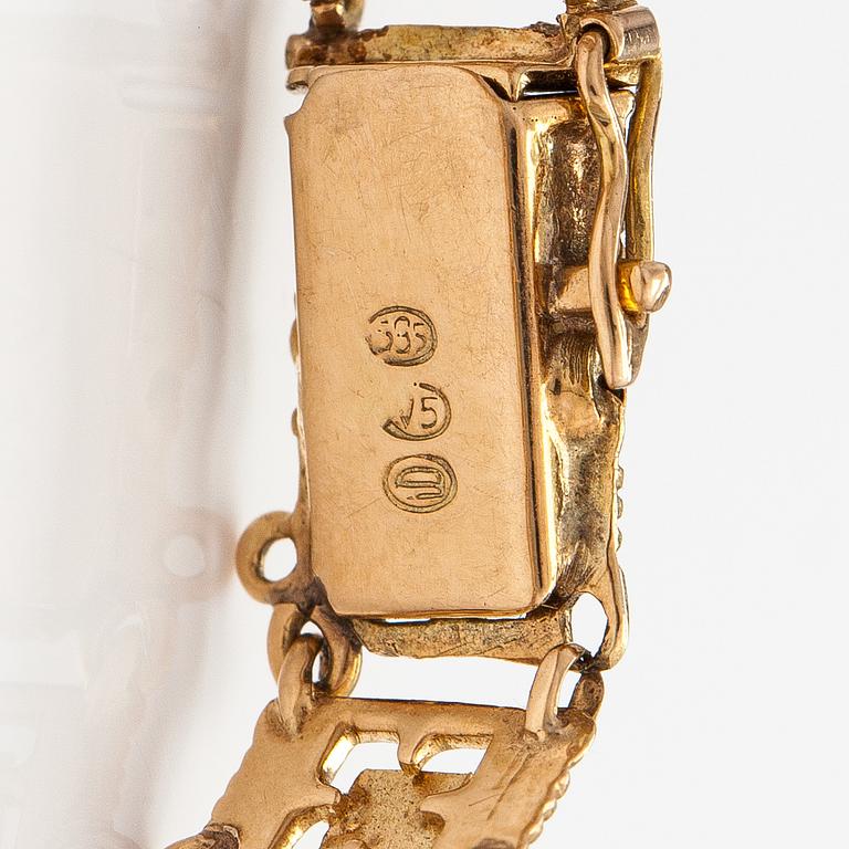 Armband, 14K guld. Kallion kulta ja kello, Helsingfors 1926.