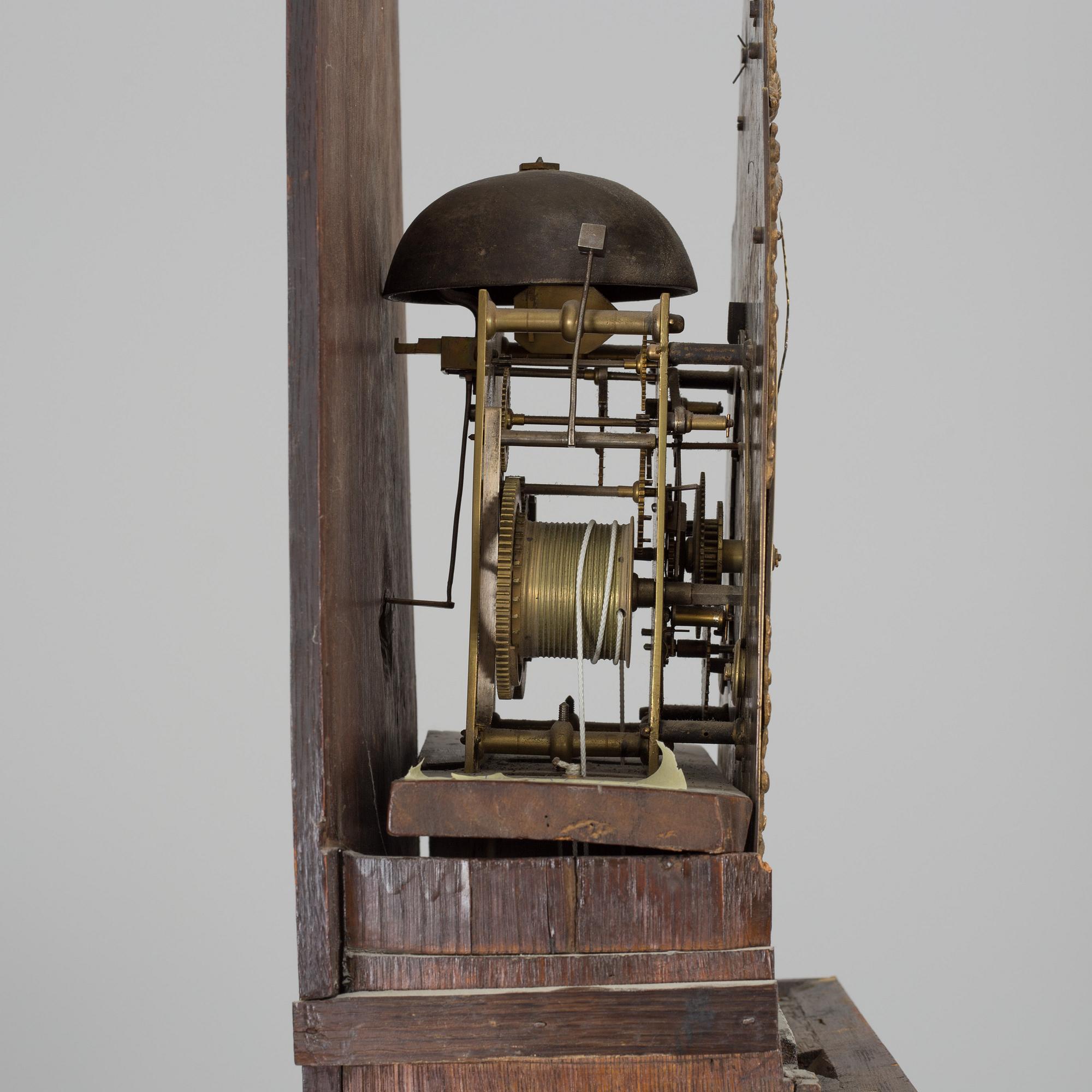 A WALNUT LONGCASE CLOCK, Benjamin Stretch, Bristol, 18th century.