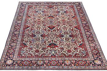 A semi.antique Kashan, c. 319 x 212 cm.