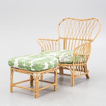 Josef Frank, Armchair with footstool, Firma Svenskt Tenn, model 311.