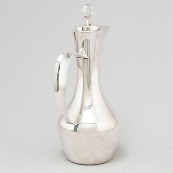 A silver claret jug from MGAB, Uppsala, 1967.