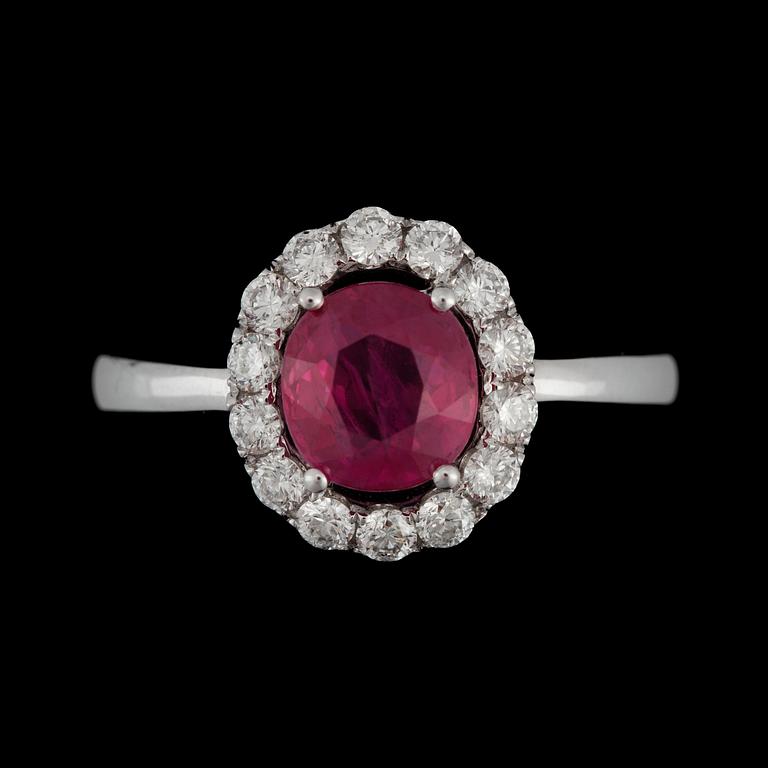 A 1.69 ct ruby and brilliant-cut diamond ring. Total carat weight on diamonds circa 0.51 ct. Quality G-H/VS.