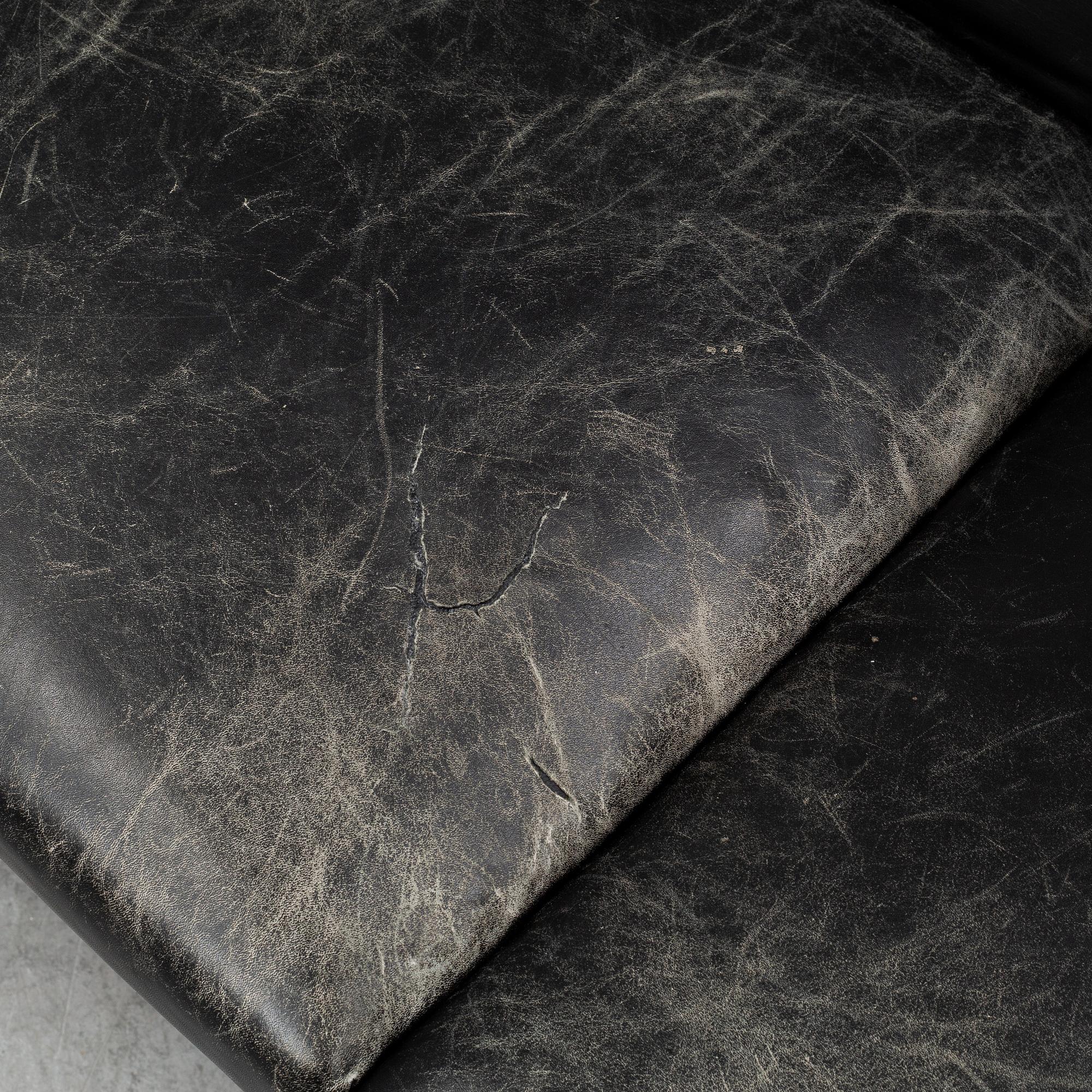 A 1960's leather covered sofa.