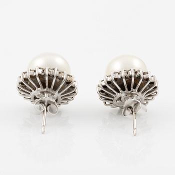 Earrings, a pair, 18K white gold with cultured pearls and brilliant-cut diamonds.