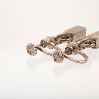 A pair of silver earrings by Wiwen Nilsson.