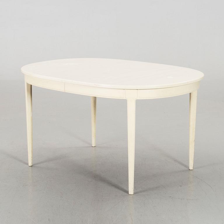 A dining group of 7 pieces by Carl Malmsten for Bodafors from the second half of the 20th century.