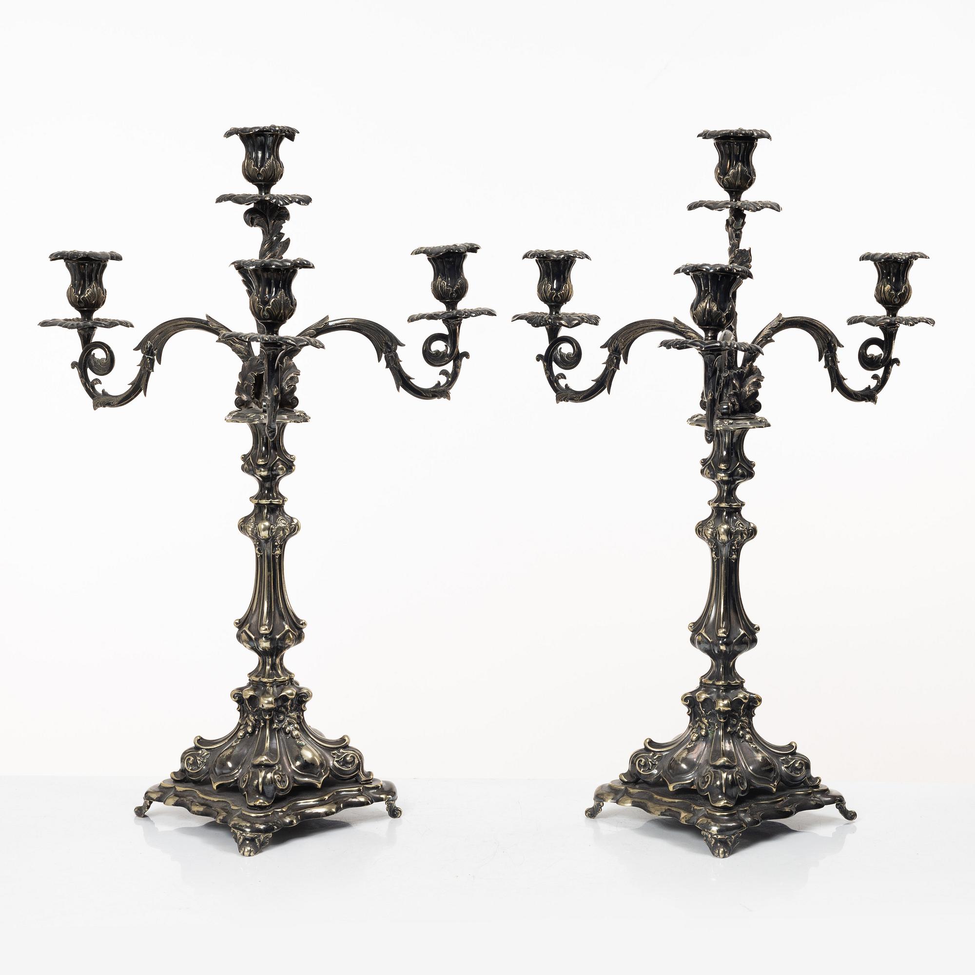 A pair of silver plated Rococo style candelabra, 20th century.