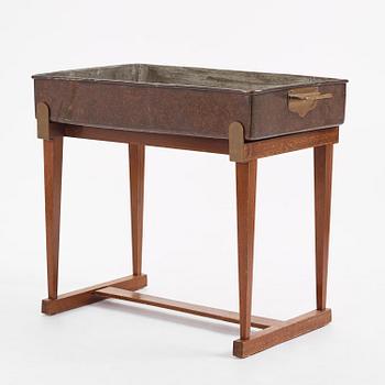 Josef Frank, a rare flower table with copper box model "2084", Firma Svenskt Tenn, mid-20th century.