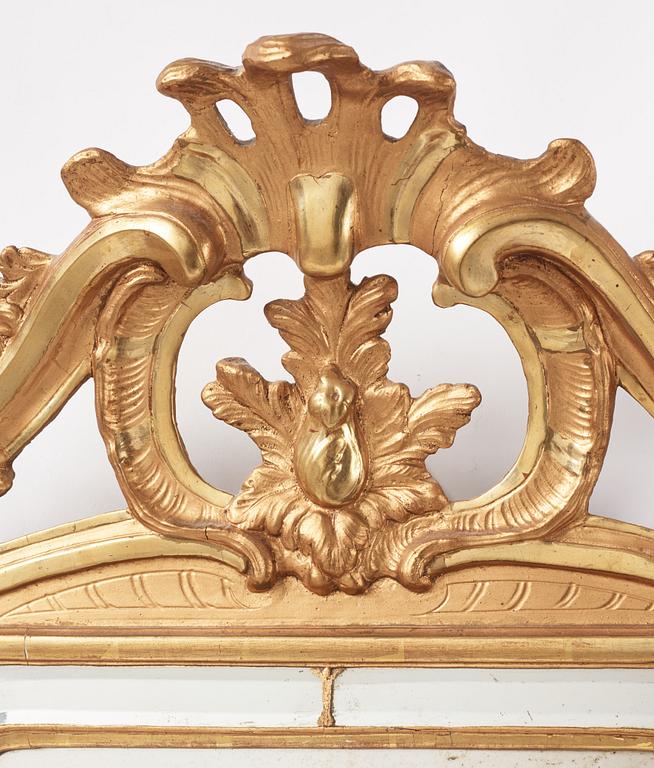 A Rococo giltwood mirror by N. Meunier (master in Stockholm 1754-97).