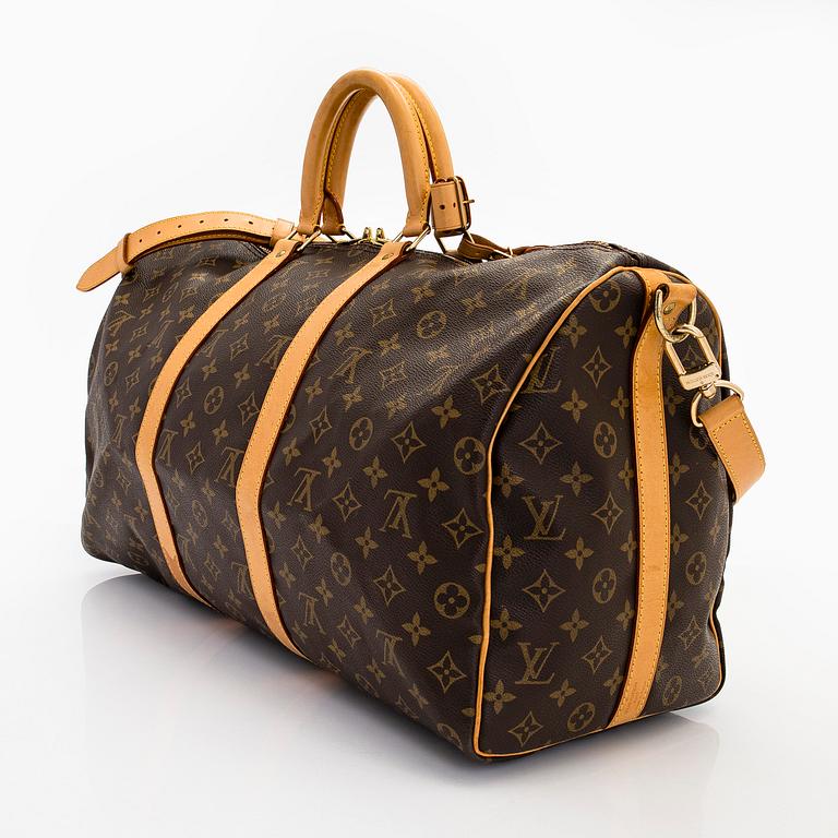 Louis Vuitton, a Monogram Canvas 'Keepall 55 Bandouliere' bag.