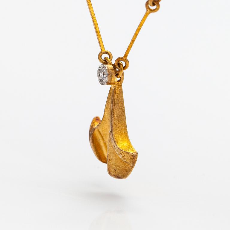 Björn Weckström, An 18K gold necklace "Hermonie" with a diamond ca. 0.02 ct. Lapponia 1979.