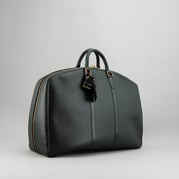 LOUIS VUITTON, 'Helanga' weekendbag with garment cover.