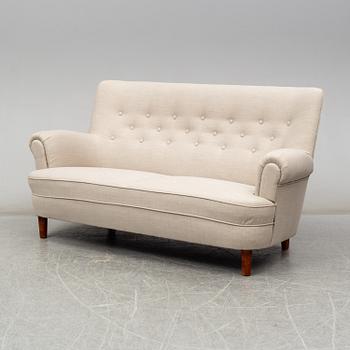 A 'Hemmakväll' sofa by Carl Malmsten.