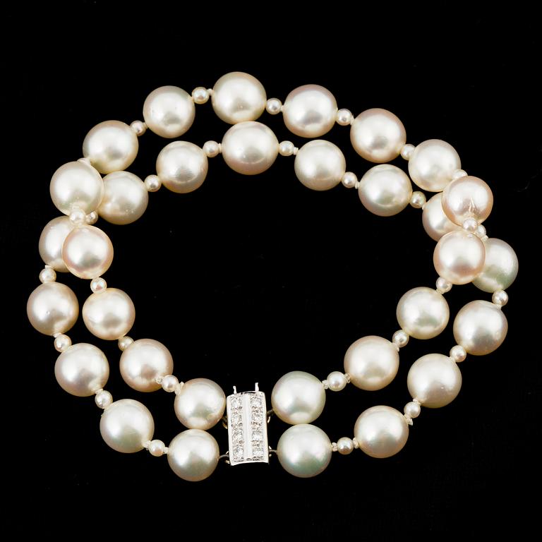 PEARL BRACELET, 2 strands of Akoya pearls with small pearls in between.