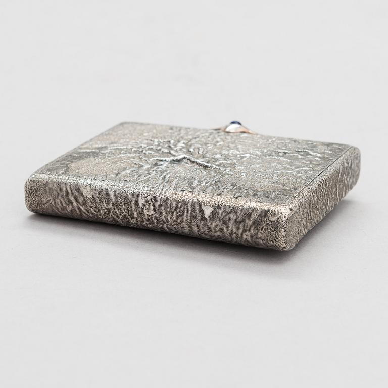 A Russian, early 20th century silver cigarette case, samorodok technique.