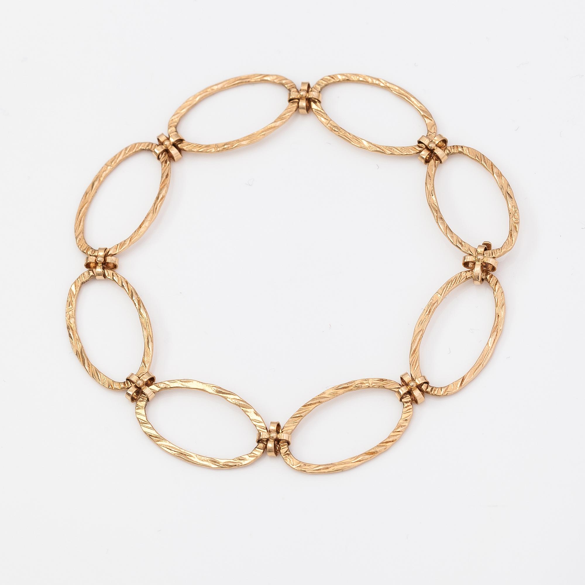 Elis Kauppi, A 14K gold necklace and bracelet. Kupittaan kulta, Turku.