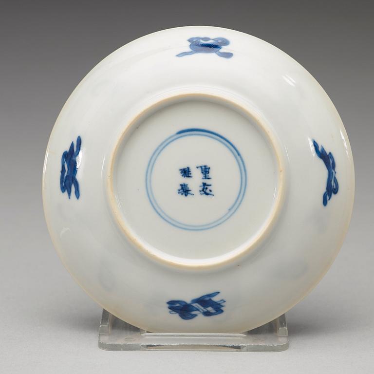 A set of four matched blue and white cups and saucers, Qing dynasty Kangxi (1662-1722).