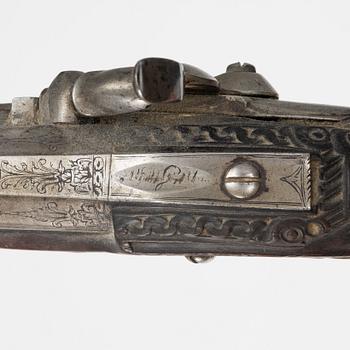 A pair of percussion pistols, converted from flintlock. 18th century.