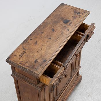 A Baroque style cabinet, circa 1900 with older parts.